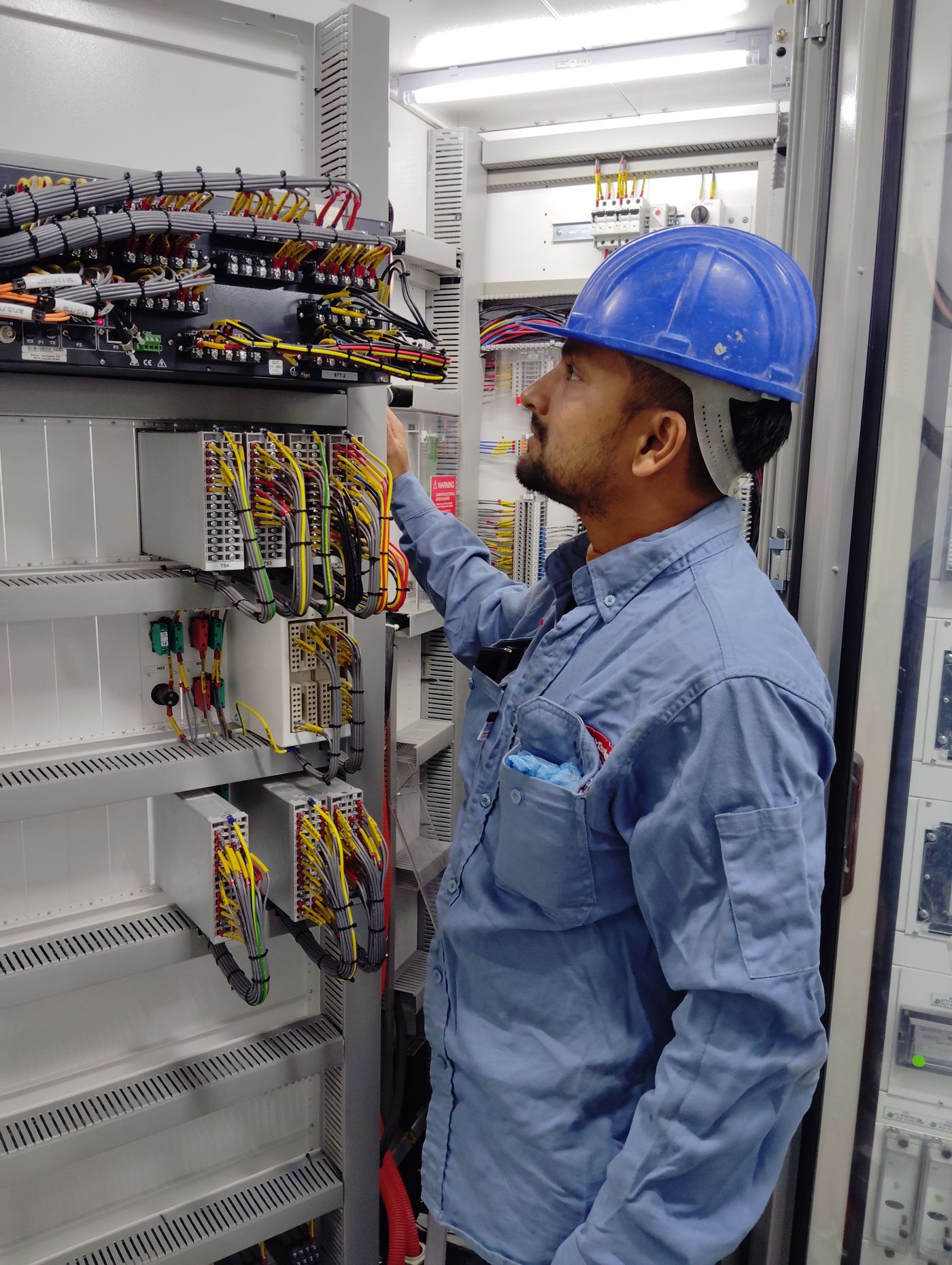 Engineers monitoring industrial control systems